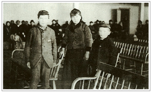 Annie Moore and her brothers Philip and Anthony arriving at Ellis Island